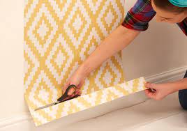 How to Put Up Wallpaper: Trim Excess Wallpaper
